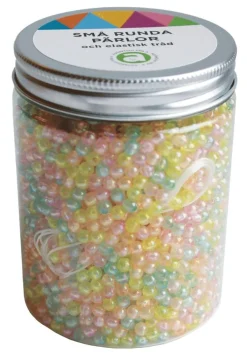 Små runda pärlor i burk ljusa färger